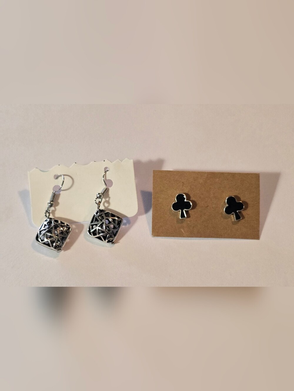 2 Pairs Of Silver Tone And Black Earrings